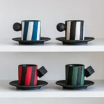 كوب قهوة سيراميك مع صحن مخطط أخضر وأسود مقبض هندسي سعة 150 مل