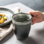 كوب قهوة سيراميك 400 مل لون رمادي غامق تصميم عضوي غير منتظم