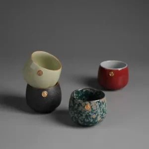 طقم أكواب قهوة بورسلين ألوان متنوعة بشعار ذهبي سعة 160 مل