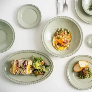 صحن تقديم بيضاوي سيراميك أخضر فاتح حواف لؤلؤية