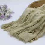 لفة قماش قطن وشيفون لتصوير المواليد لون زيتي فاتح ميرمية بنتوءات مربعة