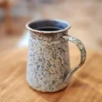 فازة ابريق قديم معدني بتشطيب معتق وصدأ فني بارتفاع 20 سم لديكور ريفي وفنتج فاخر