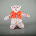 دبدوب الذكريات القماشي أبيض بنقوش ورود برتقالية مقاس 35 سم بفيونكة برتقالية زاهية لهدايا الأطفال وديكور غرف النوم