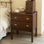 كمودينة خشب طبيعي درجين بمقابض صدفة وحواف متموجة لغرف النوم